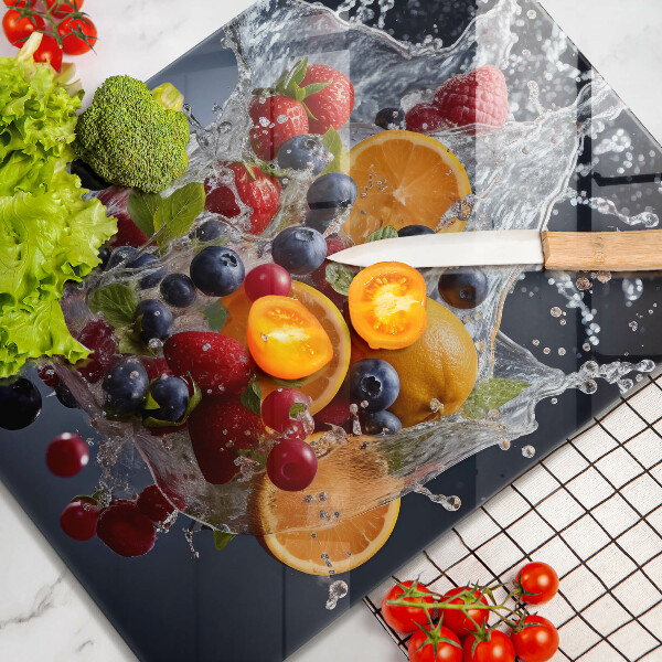 Skärbräda i glas Frukt i vatten