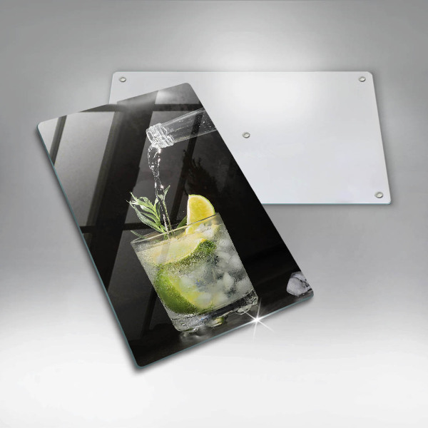 Skärbräda i glas Ett glas vatten