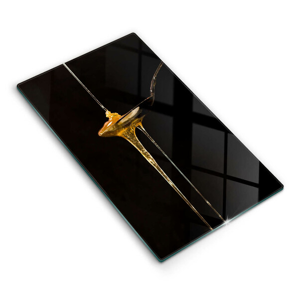 Skärbräda i glas En tesked honung