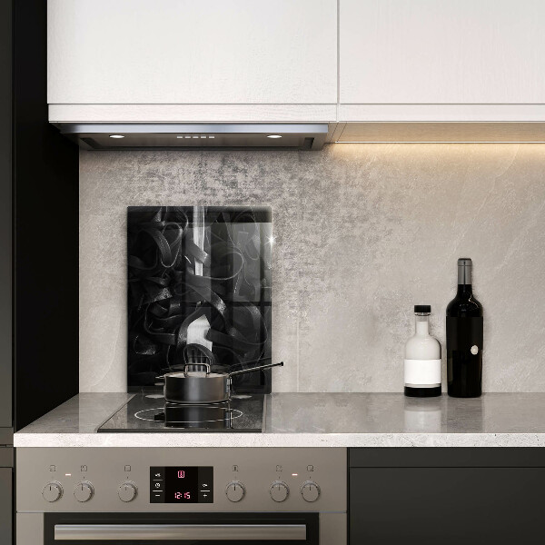 Skärbräda i glas Svart pasta och gaffel