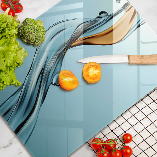 Skärbräda i glas Vattenstråle