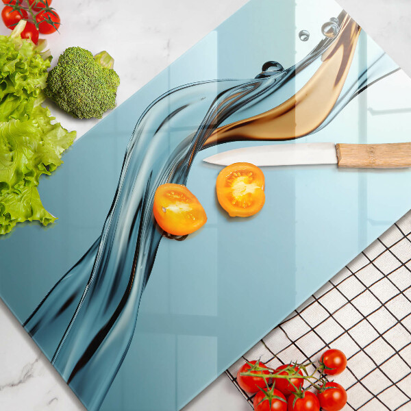 Skärbräda i glas Vattenstråle