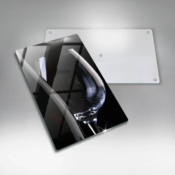 Skärbräda i glas Ett glas och en flaska