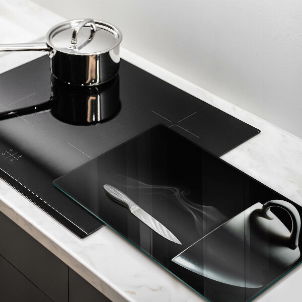 Skärbräda i glas En kopp te