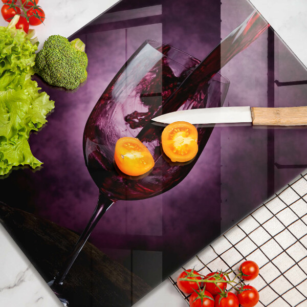 Skärbräda i glas Ett glas vin