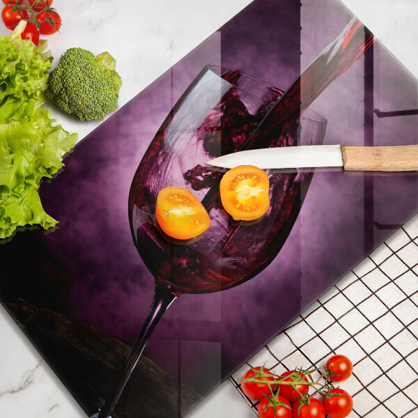 Skärbräda i glas Ett glas vin