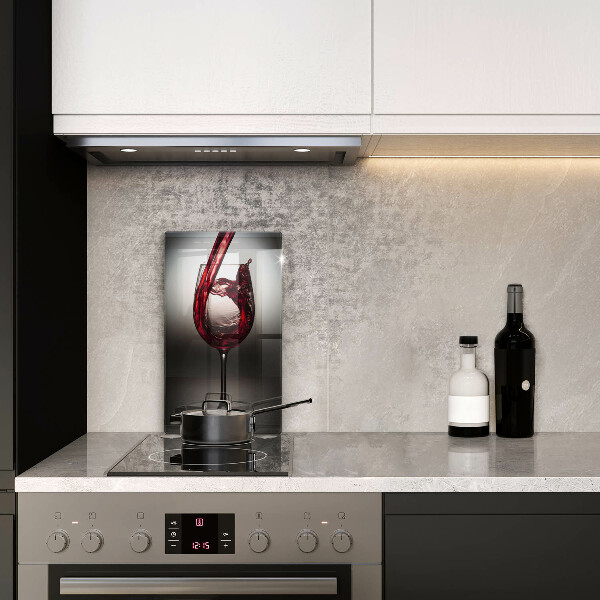 Skärbräda i glas Ett glas och rött vin