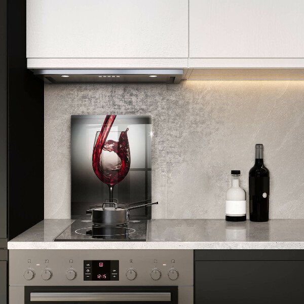 Skärbräda i glas Ett glas och rött vin