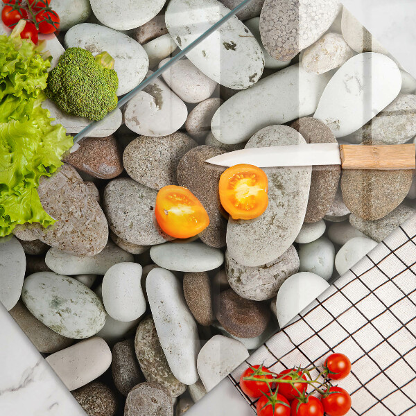 Skärbräda glas Små stenar bakgrund