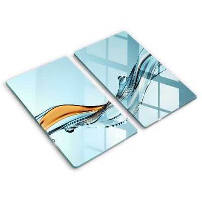 Skärbräda glas Vatten på en blå bakgrund