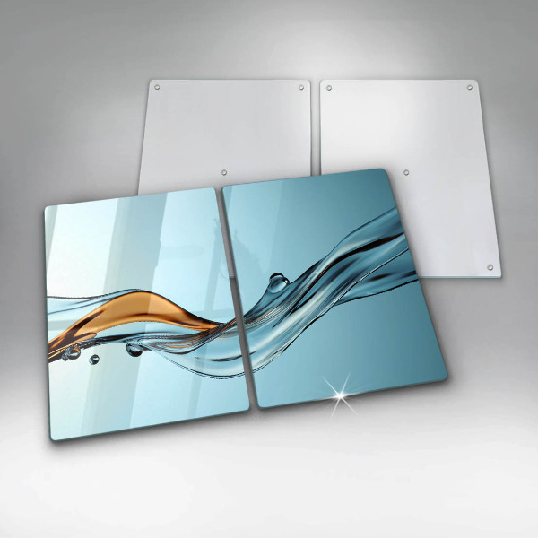 Skärbräda glas Vatten på en blå bakgrund