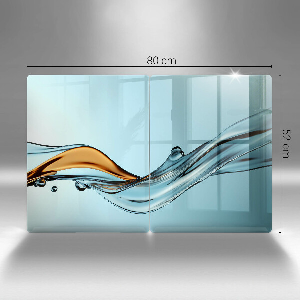 Skärbräda glas Vatten på en blå bakgrund