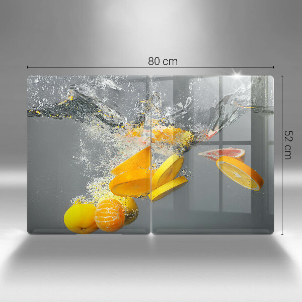 Skärbräda glas Citroner i vatten