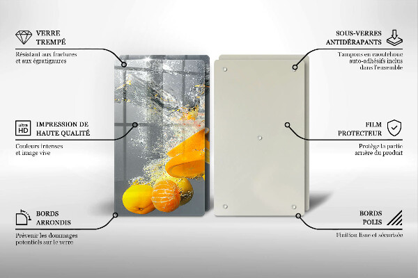 Skärbräda glas Citroner i vatten