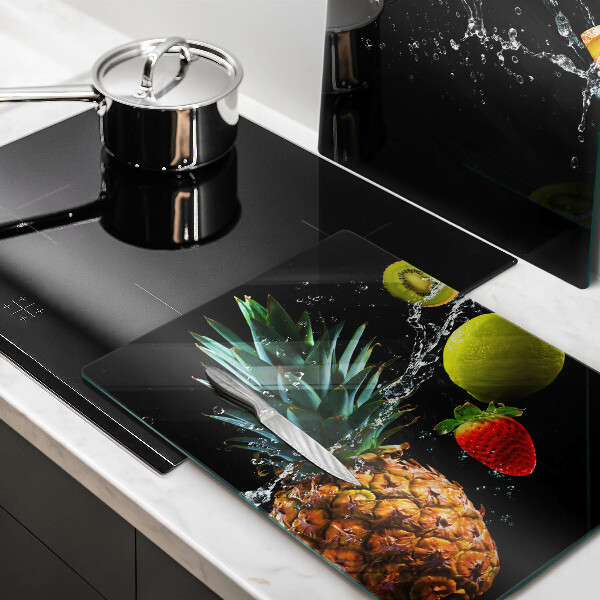 Skärbräda glas Frukt i vatten