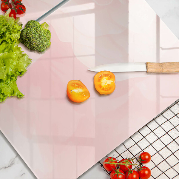 Skärbräda glas Pastellrosor bakgrund