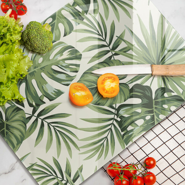 Glasskärbräda Illustration av monstera blad