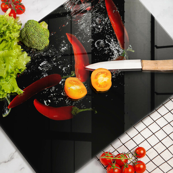 Skärbräda i härdat glas Chilipeppar i vatten