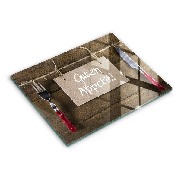 Skärbräda i härdat glas På brädorna står det Guten Apetit