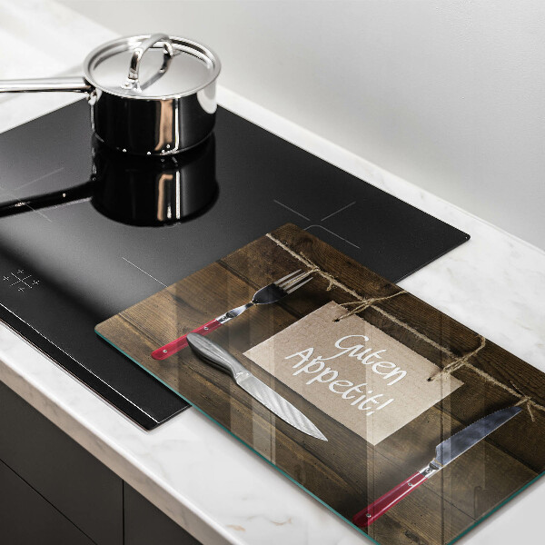 Skärbräda i härdat glas På brädorna står det Guten Apetit