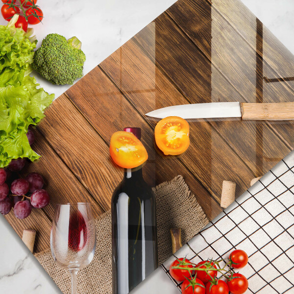 Skärbräda i härdat glas En flaska rött vin