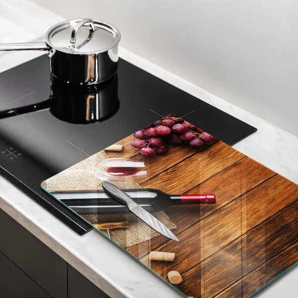 Skärbräda i härdat glas En flaska rött vin