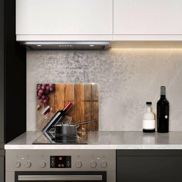 Skärbräda i härdat glas En flaska rött vin