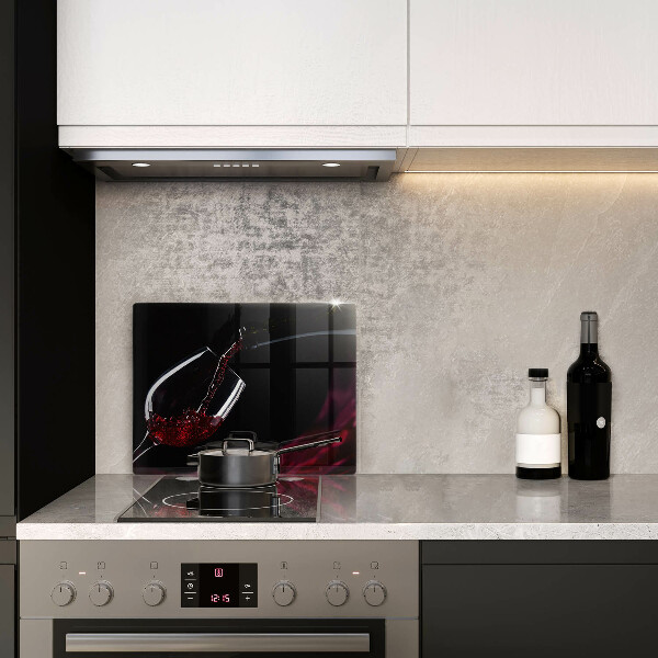 Skärbräda i härdat glas Ett glas rött vin