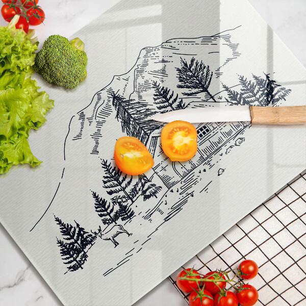 Skärbräda i härdat glas Ritning av ett hus i bergen