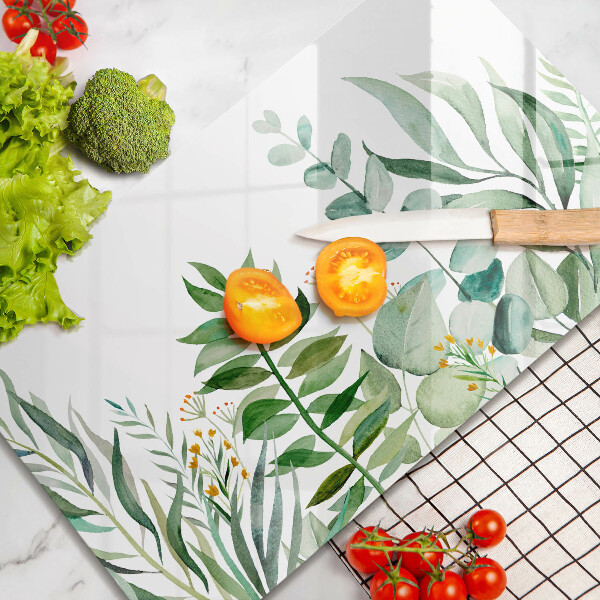 Skärbräda i härdat glas Illustration av växtblad