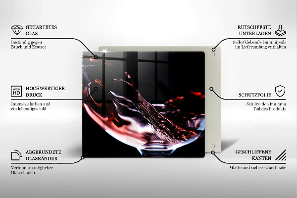 Skärbräda av glas Ett glas rött vin