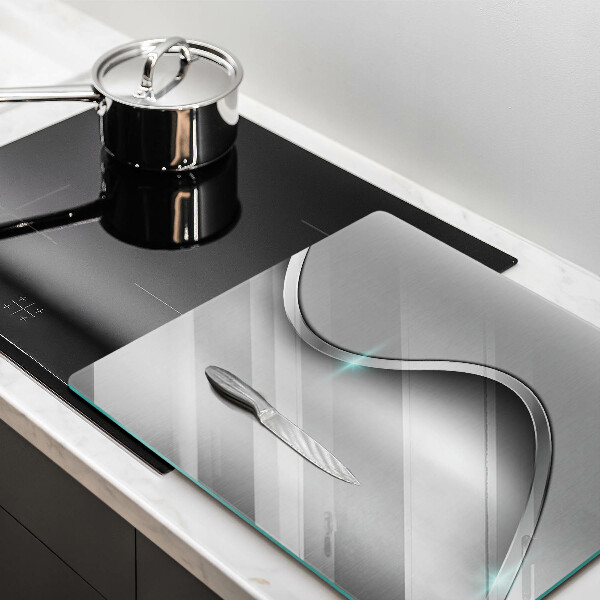 Skärbräda av glas Metallabstraktion