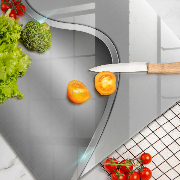 Skärbräda av glas Metallabstraktion