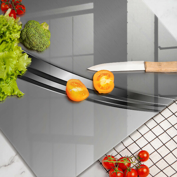 Skärbräda av glas Metallabstraktion