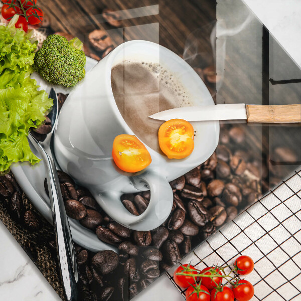 Skärbräda av glas Kopp och kaffebönor