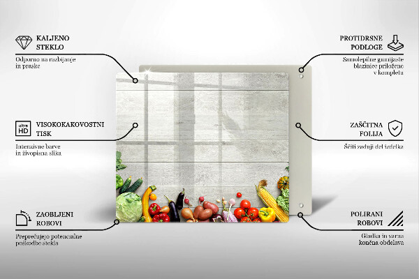 Skärbräda av glas Grönsaker på brädor