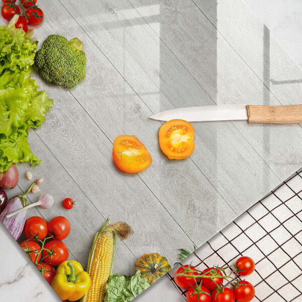 Skärbräda av glas Grönsaker på brädor