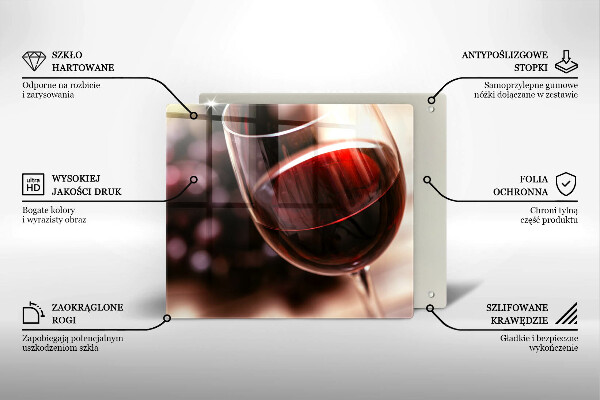 Skärbräda av glas Ett glas rött vin