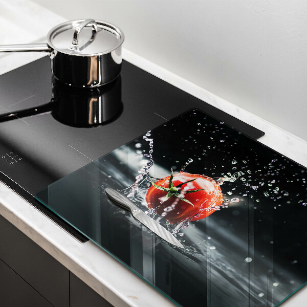 Skärbräda av glas Tomat i vatten