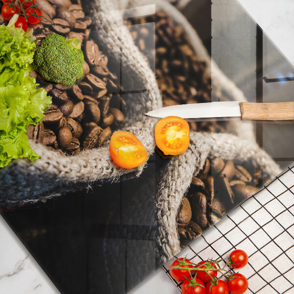 Skärbräda av glas Påsar med kaffebönor