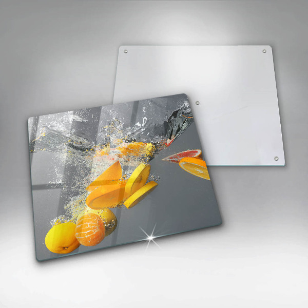 Skärbräda av glas Citroner i vatten