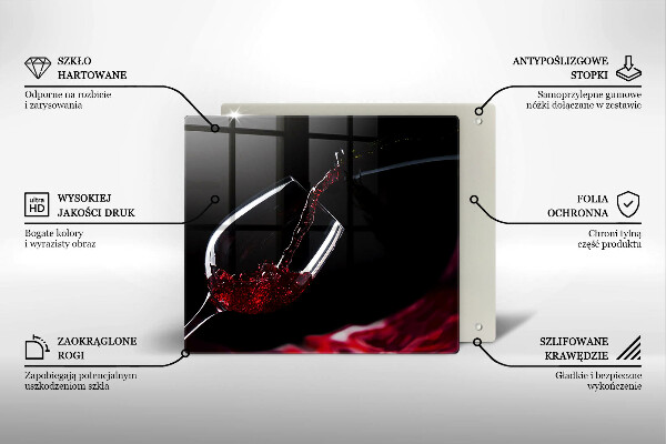 Skärbräda av glas Ett glas rött vin