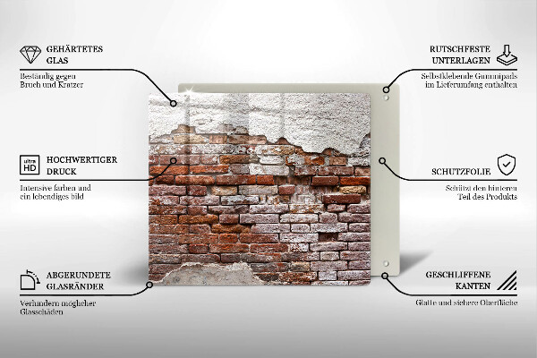 Skärbräda av glas Gammal tegel- och betongvägg
