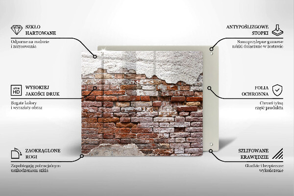 Skärbräda av glas Gammal tegel- och betongvägg