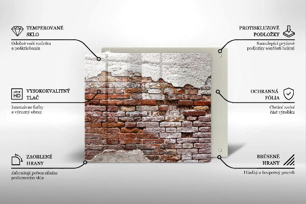 Skärbräda av glas Gammal tegel- och betongvägg