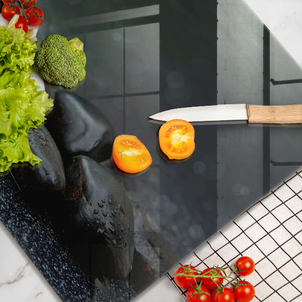 Skärbräda av glas Vita blomma zen stenar