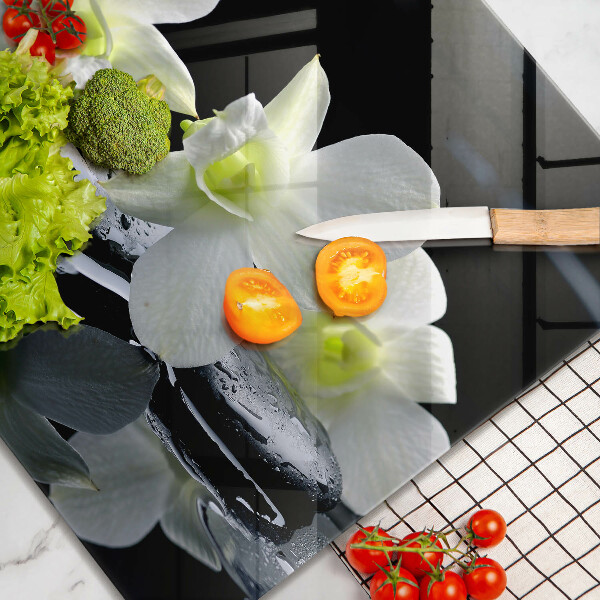 Skärbräda av glas Vita blommor i vatten Zen