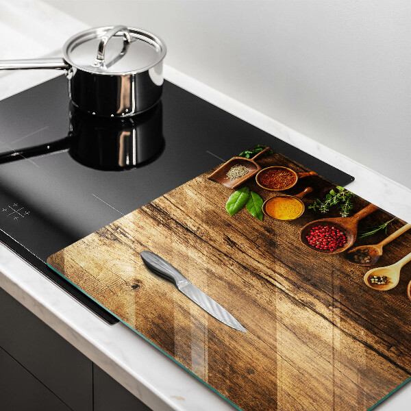 Skärbräda av glas Kryddskedar av trä