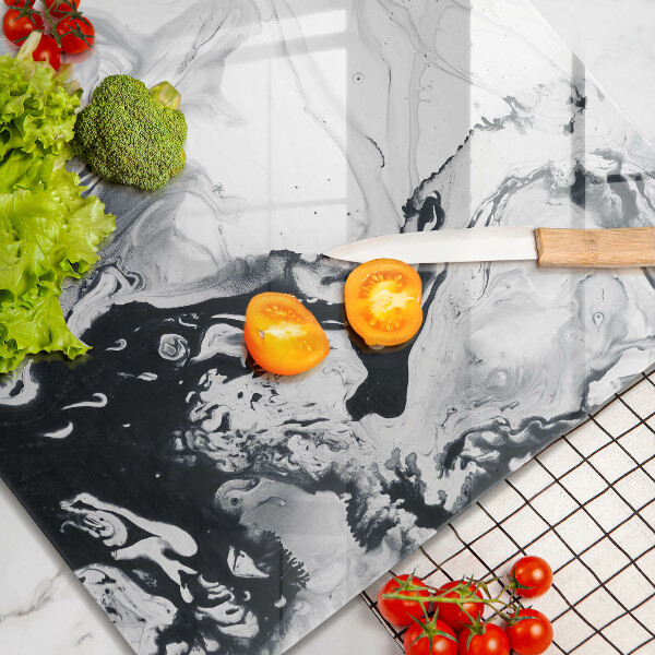 Skärbräda av glas Bläckabstraktion