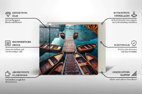 Skärbräda av glas Båtar på sjön